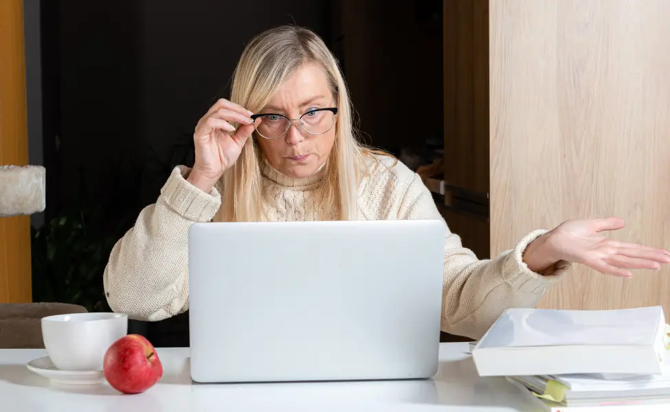 Confused woman at computer